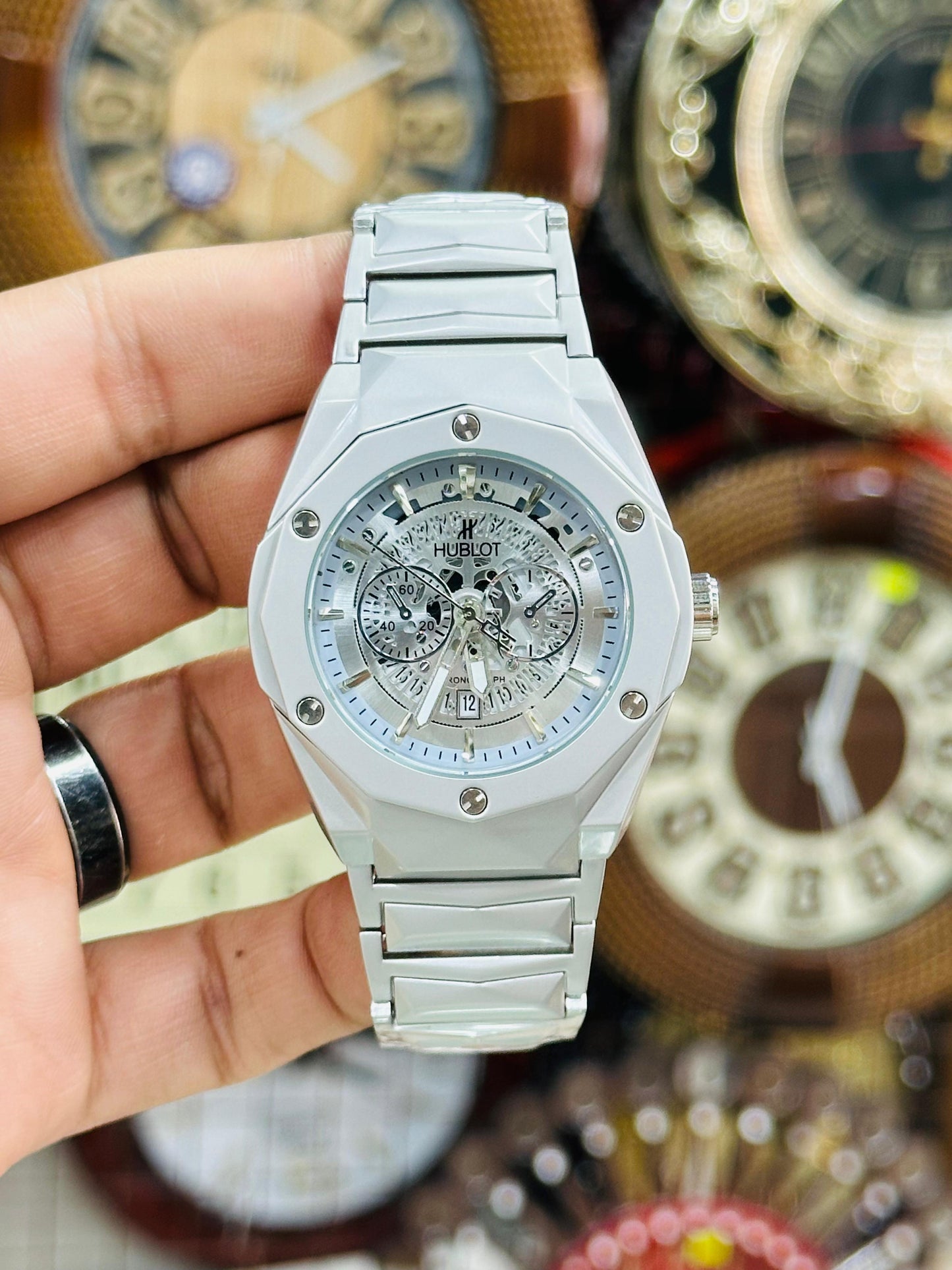 Hublot Diamond Cut Date watch.